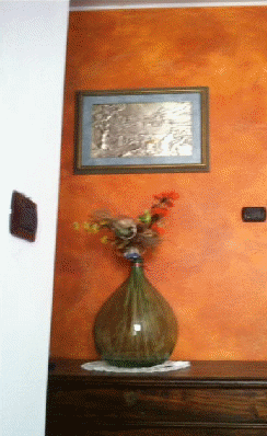 Parete finita arancio decorata con rifiniture di lusso Perugia